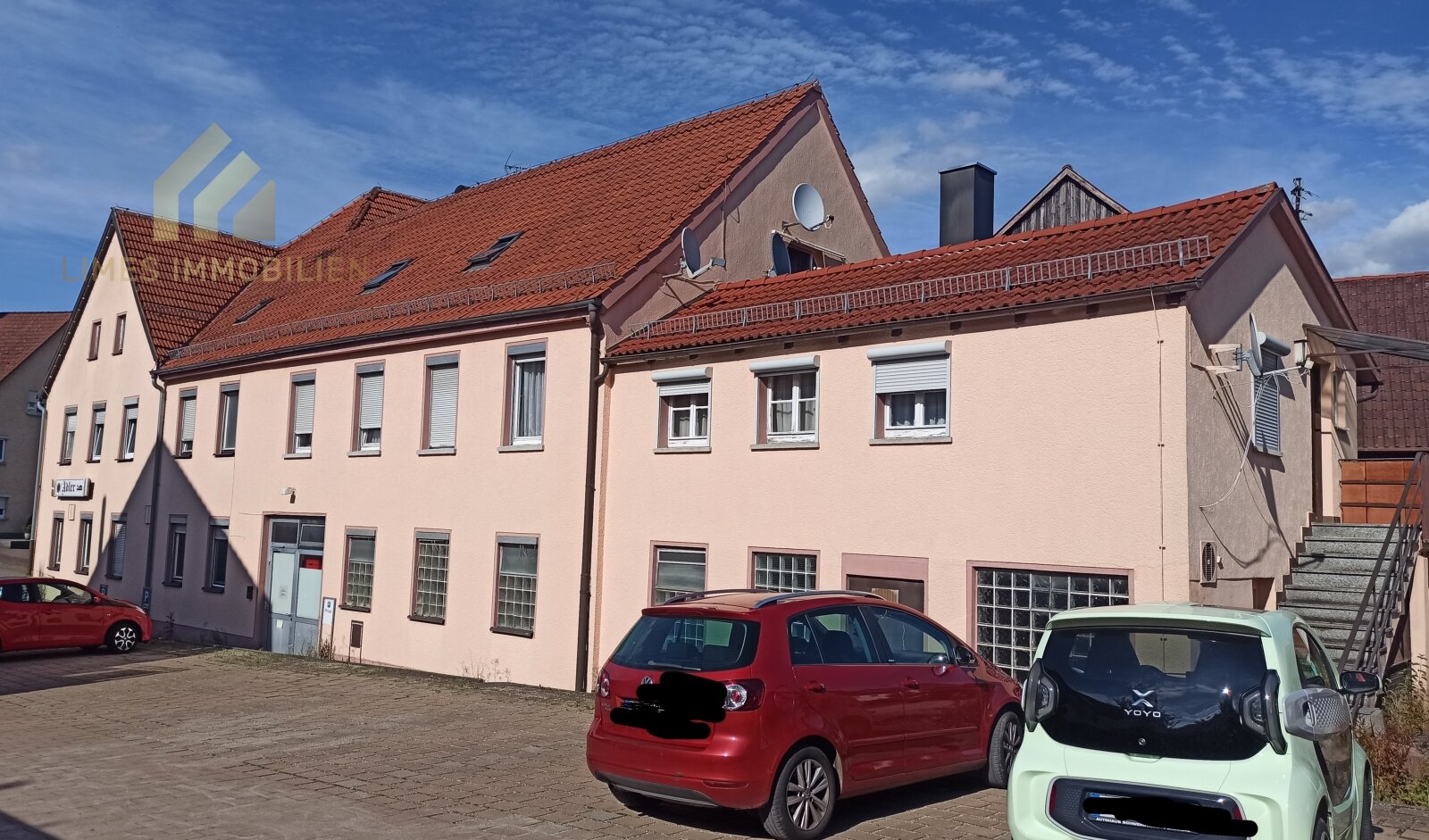 Mehrfamilienhaus mit Gewerbeeinheit und Baugrundstück zum Kauf