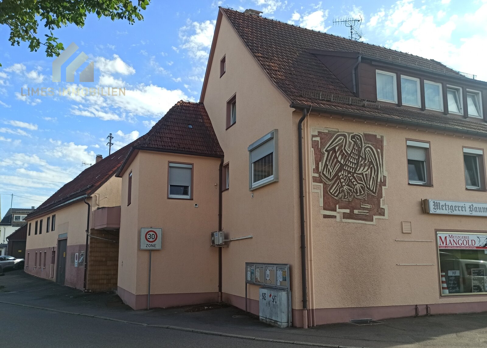 Mehrfamilienhaus mit Gewerbeeinheit und Baugrundstück zum Kauf