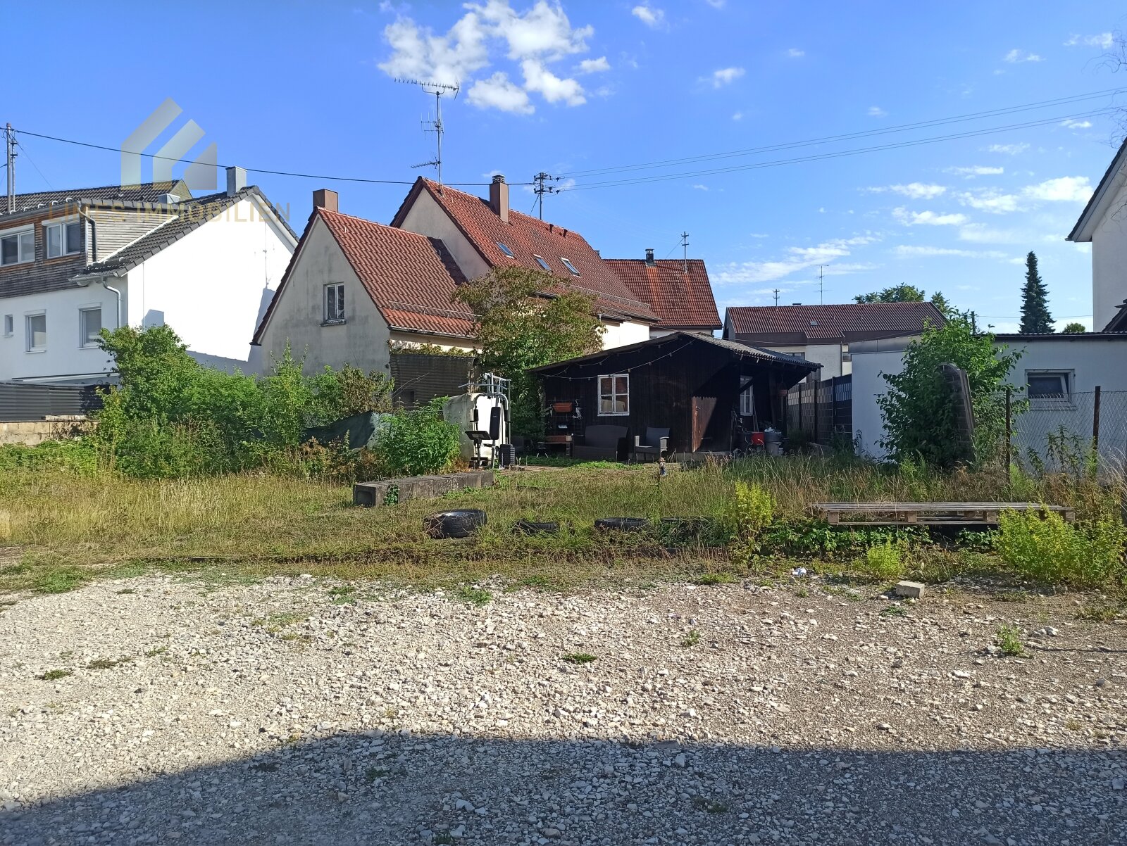 Mehrfamilienhaus mit Gewerbeeinheit und Baugrundstück zum Kauf
