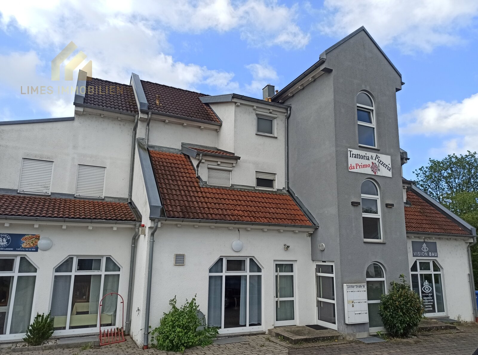 Mehrfamilienhaus mit Restaurant und Büroeinheit